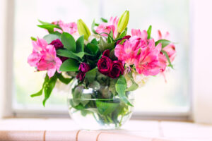 a vase of lilies and roses are toxic to pets